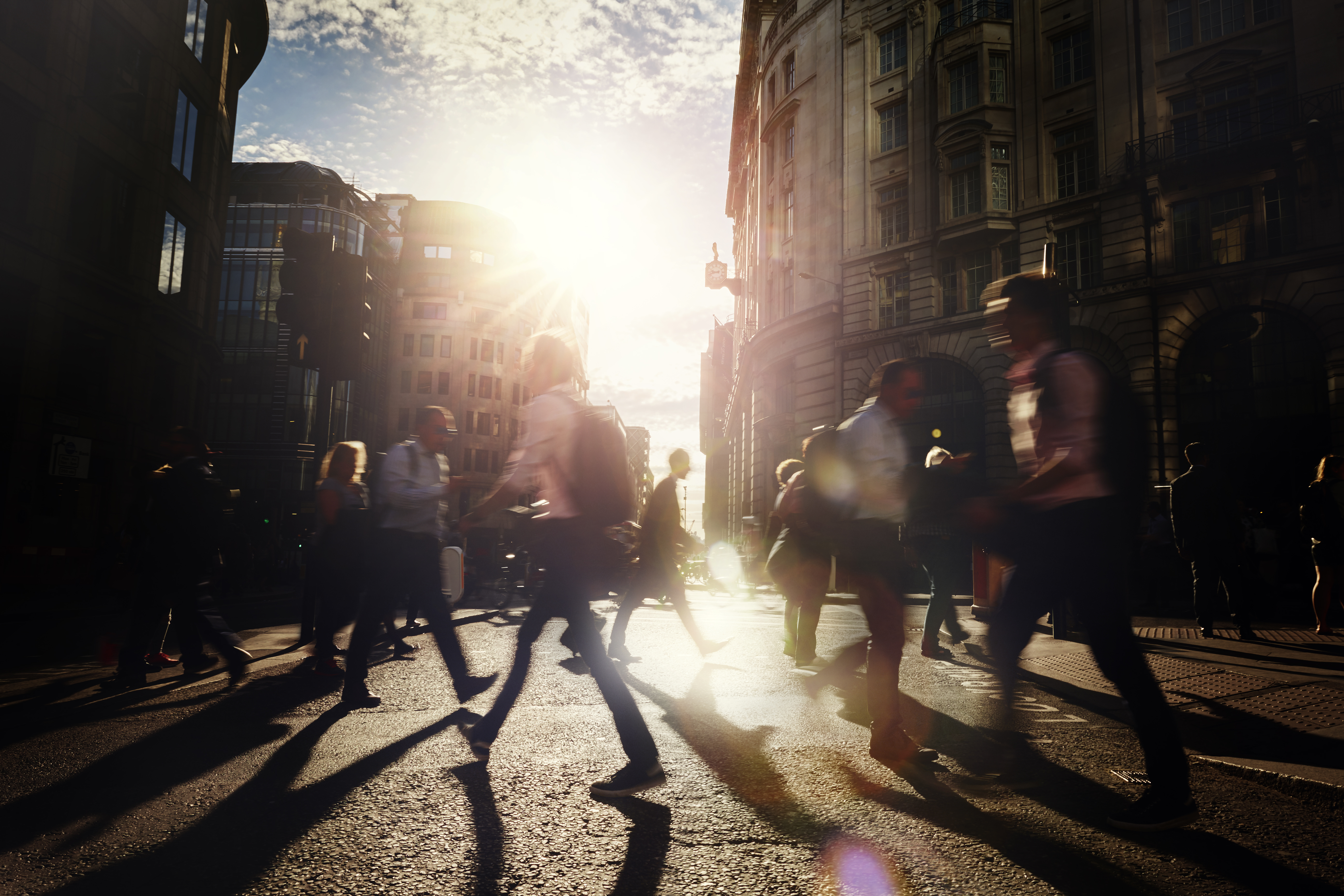 Busy business people walking through the city.