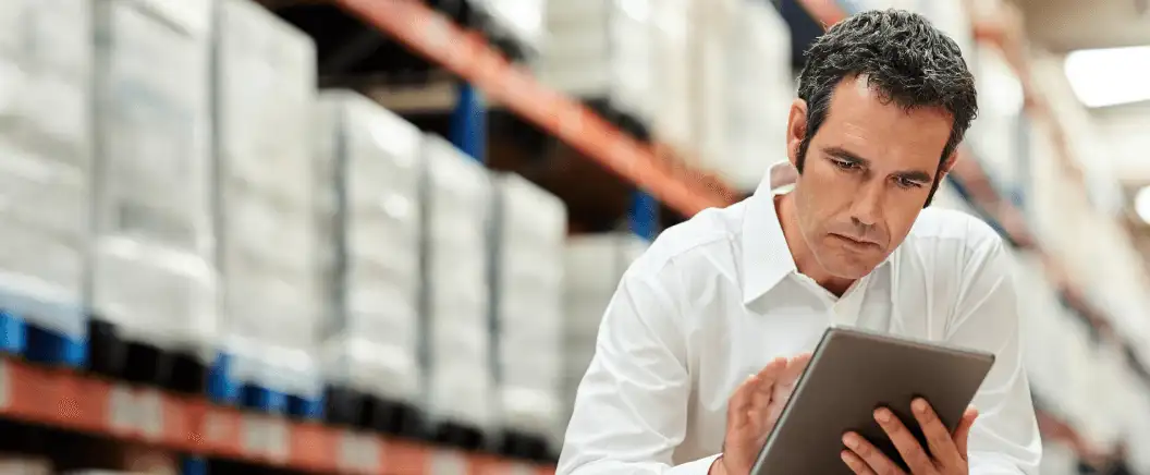 A procurement professional uses DocuSign on a tablet